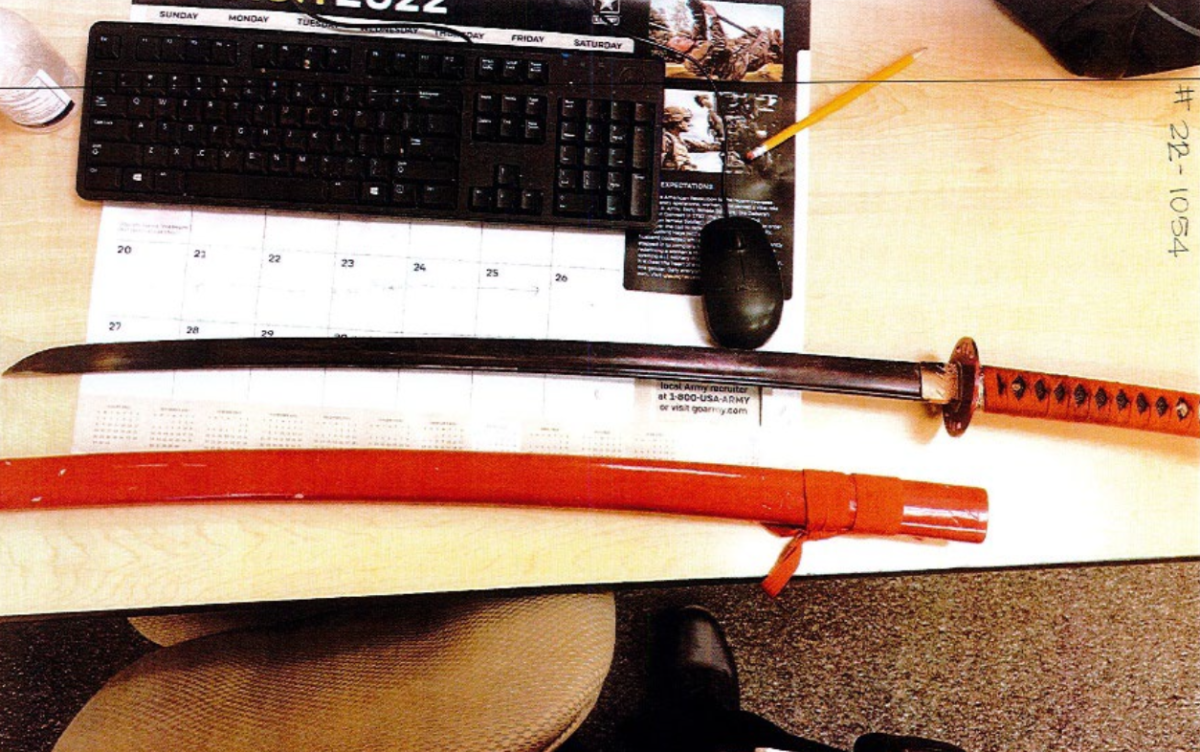 A lawsuit was filed after a teacher brought in swords, including a samurai-style sword, and held sword fights in a classroom in New Mexico. (Image from lawsuit)